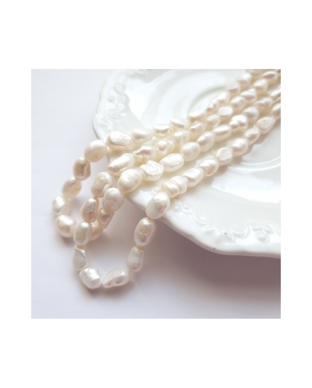 Perlai gėlavandeniai baltos sp., netaisyklingos formos 5-7x9-10 mm, 1 vnt.