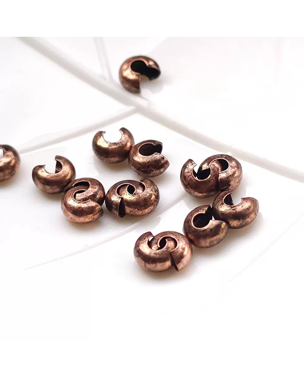 Spaustukų paslėpėjai, antik. bronzos sp., 4 mm, 20 vnt.